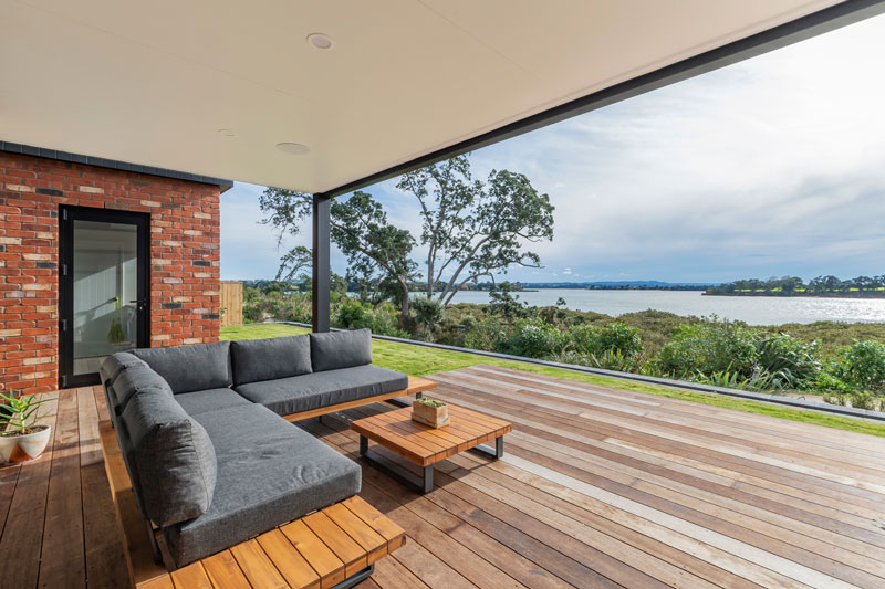 Beauitful view from back deck of designer home in Glenbrook. Red recycled brick features