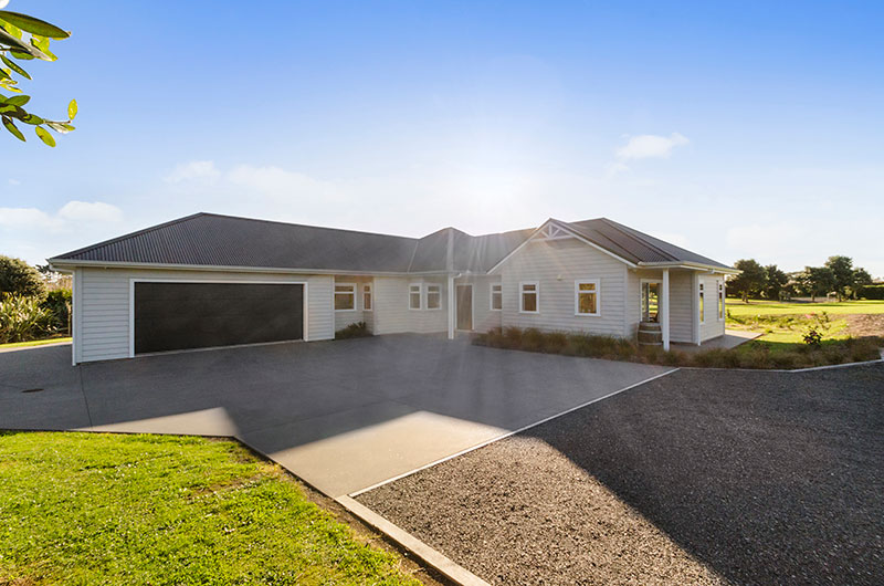 Drive and Entrance to new traditional style home