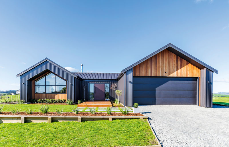 Beauitful award winning pavillion style home in Franklin clad in Cedar and Axon panel by James Hardie